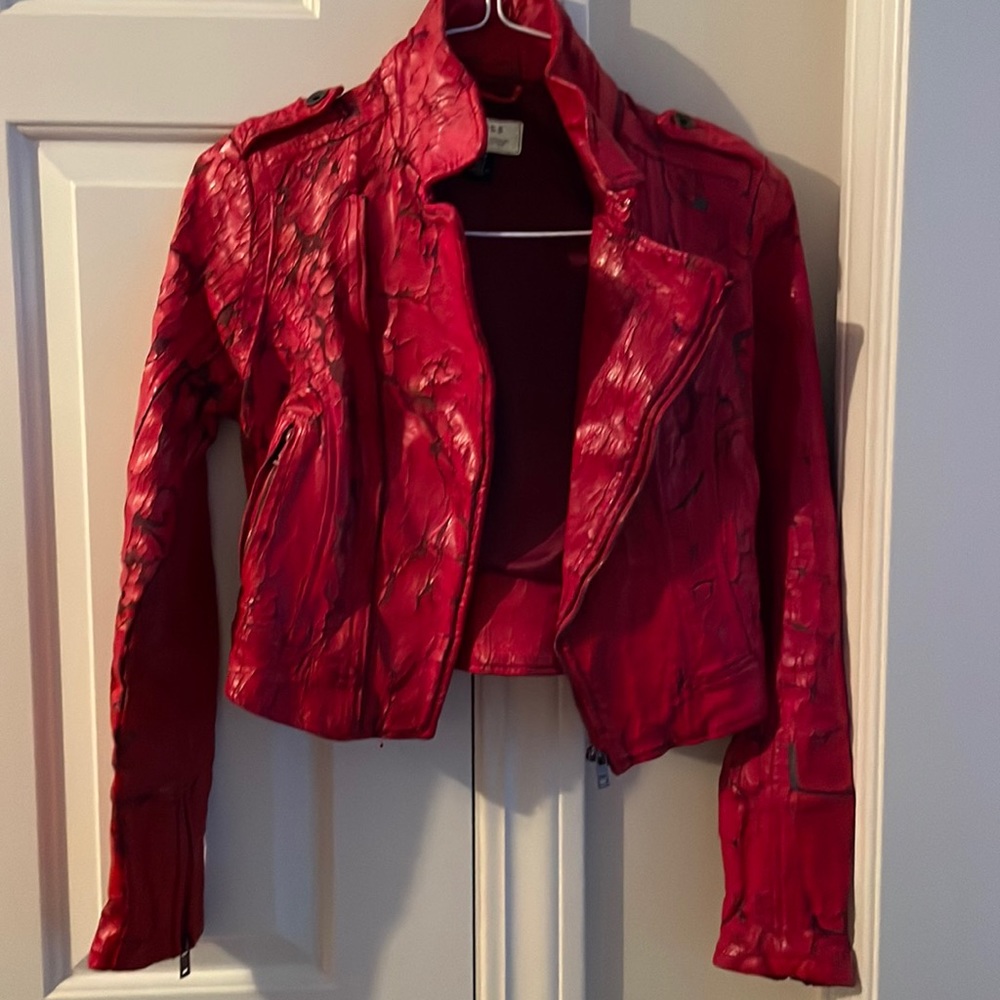 Guess distressed faux leather jacket in red.